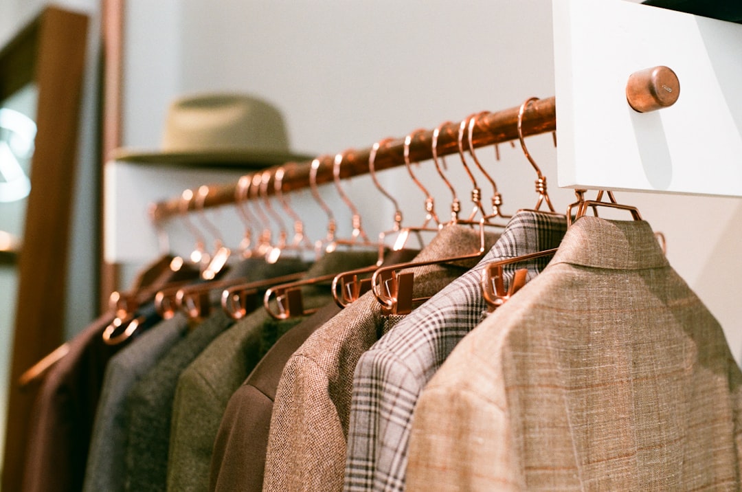 Home a-rack-of-clothes-hanging-on-a-wall-iv08-pfh2nq